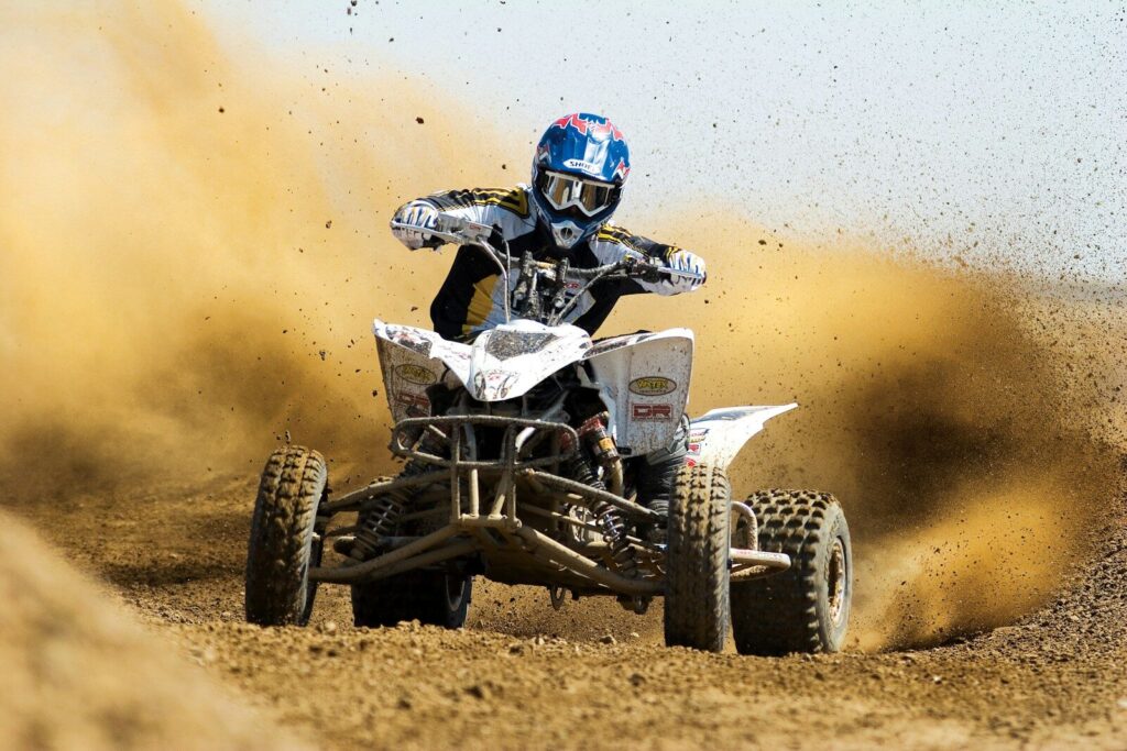 From Accident to Justice: A Journey Through the Injury Law Process 3 man riding ATV on the dessert